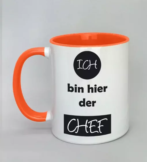 Spruchtasse Ich bin hier der Chef Innenseite orange