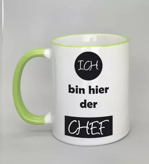 Spruchtasse Ich bin hier der Chef Rand hellgrün