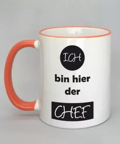 Spruchtasse Ich bin hier der Chef Rand orange