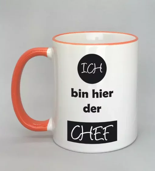 Spruchtasse Ich bin hier der Chef Rand orange