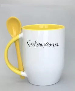 Keramiktasse mit Löffel gelb