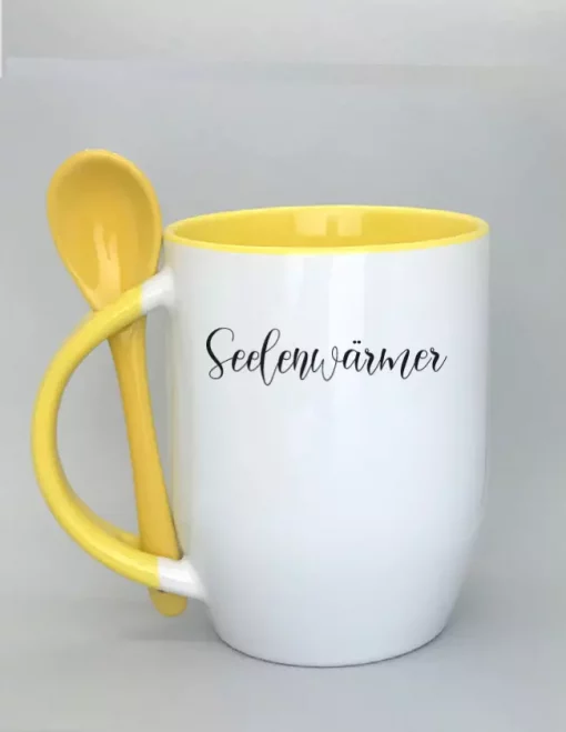 Keramiktasse mit Löffel gelb
