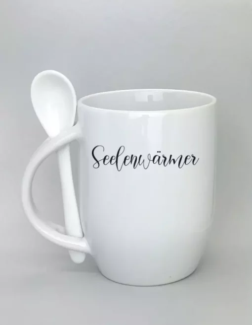 Keramiktasse mit Löffel weiß